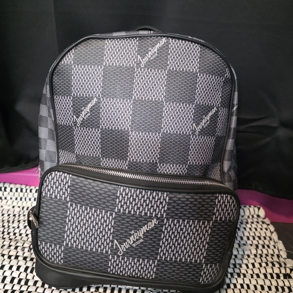 Large Journeyman Black and Gray Checkered Backpack